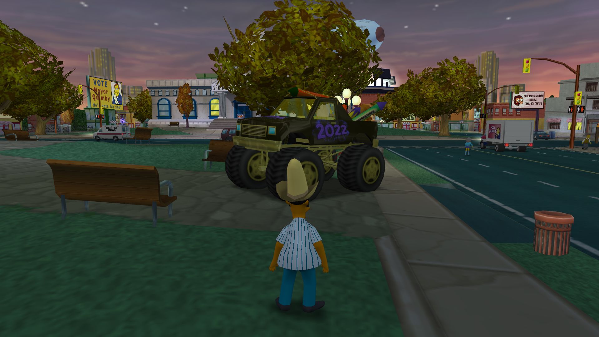 Apu standing in front of the New Year's 2022 Monster Truck.
